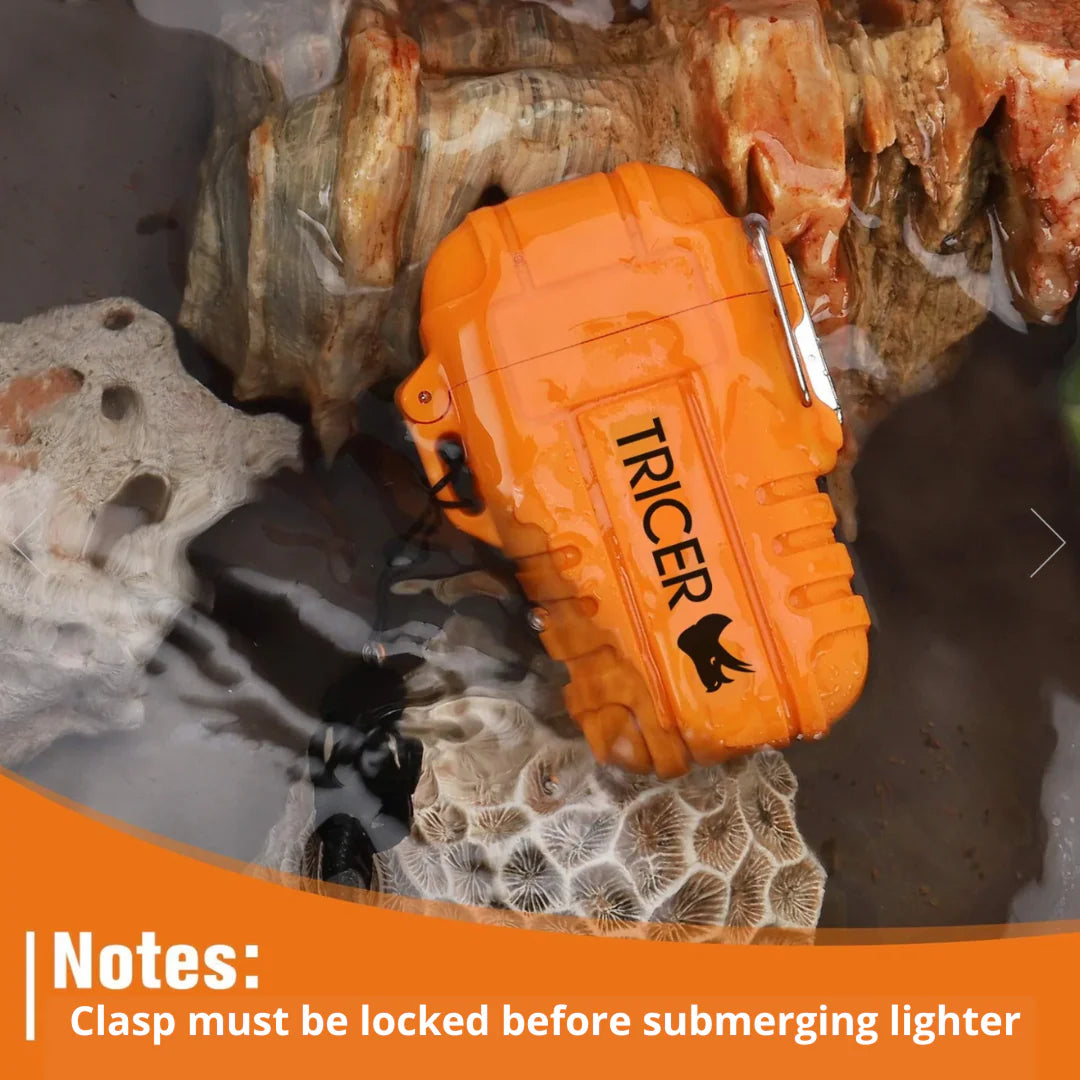 Orange lighter with 'TRICER' branding on a rocky surface