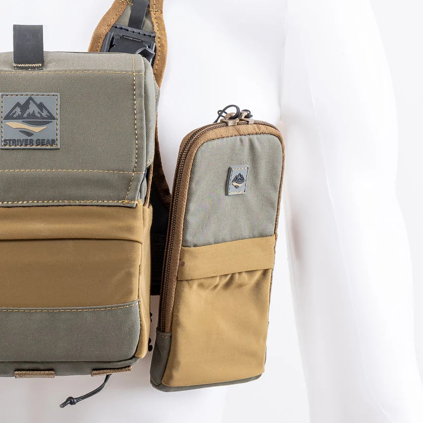 Striver Gear phone pouch strapped to a bino harness on a white background