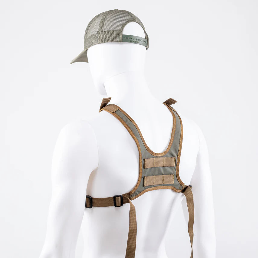 Mannequin wearing a brown and gray tactical harness and cap on a white background