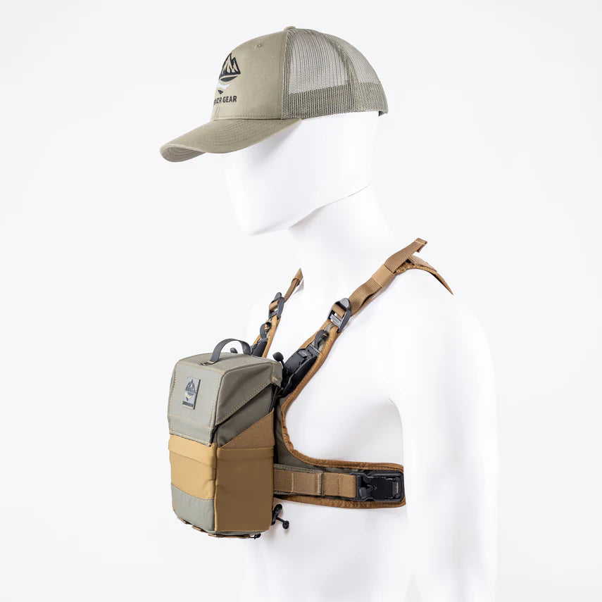 Tan and beige binocular harness with matching cap on a white background