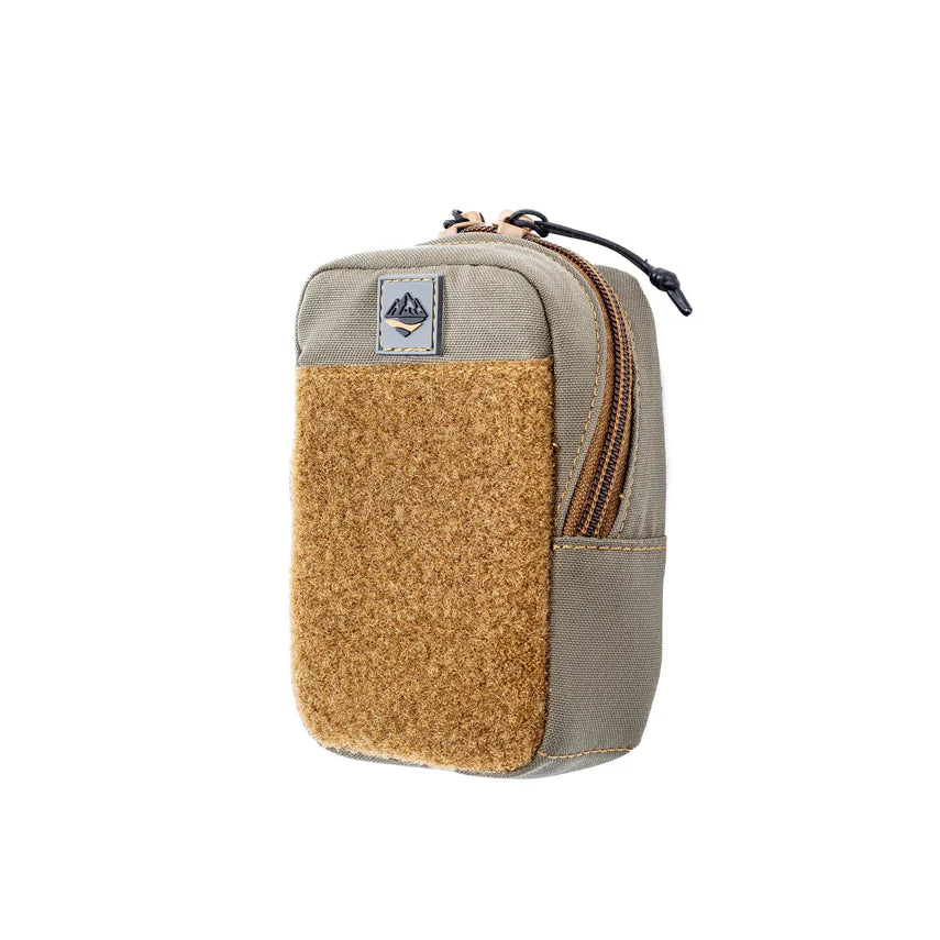 Small pouch with cork texture and zipper on a white background
